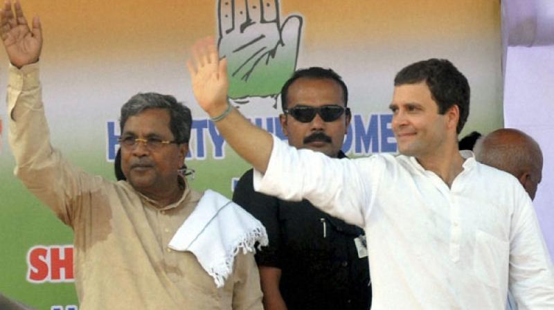 The Congress said that a mega event will be organised in the state capital on Indira Gandhi's birthday on November 19. In picture: File photo of Congress Vice-President Rahul Gandhi and Karnataka Chief Minister Siddaramaiah. (Photo: PTI) The Congress said that a mega event will be organised in the state capital on Indira Gandhi's birthday on November 19. In picture: File photo of Congress Vice-President Rahul Gandhi and Karnataka Chief Minister Siddaramaiah. (Photo: PTI)