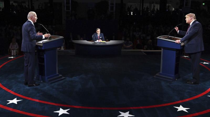 President Donald Trump and Democratic presidential candidate former Vice President Joe Biden participate in the first presidential debate Tuesday, Sept. 29, 2020, at Case Western University and Cleveland Clinic, in Cleveland. AP