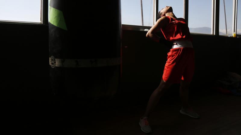 A boxer getting ready for her bout. AP Photo