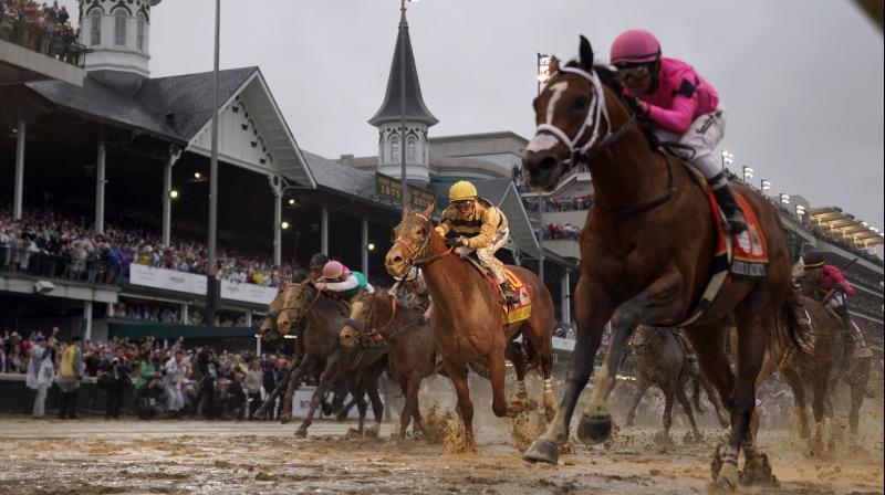 In this May 4, 2019, file photo, Luis Saez rides Maximum Security (R) across the finish line first against Flavien Prat on Country House during the 145th running of the Kentucky Derby at Churchill Downs in Louisville, Kentucky. AP Photo In this May 4, 2019, file photo, Luis Saez rides Maximum Security (R) across the finish line first against Flavien Prat on Country House during the 145th running of the Kentucky Derby at Churchill Downs in Louisville, Kentucky. AP Photo
