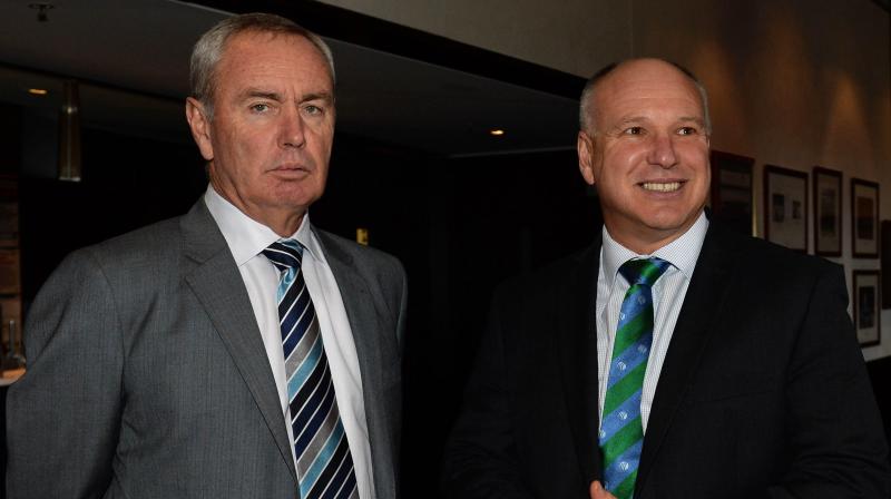 New Zealand Cricket chief David White (R) with the International Cricket Council president Alan Isaac. AFP Photo