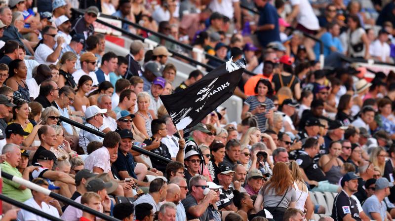 Spectators at a rugby game. AFP Photo