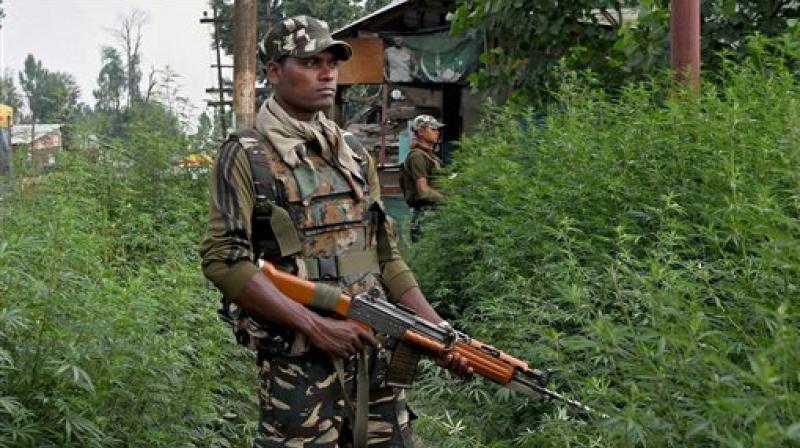 Security personnel during the search operation for militants at the site of Monday's attack on a yatri bus in which seven pilgrims were killed and 19 others injured, at Batango in Anantnag district of South Kashmir on Tuesday. (Photo: PTI) Security personnel during the search operation for militants at the site of Monday's attack on a yatri bus in which seven pilgrims were killed and 19 others injured, at Batango in Anantnag district of South Kashmir on Tuesday. (Photo: PTI)