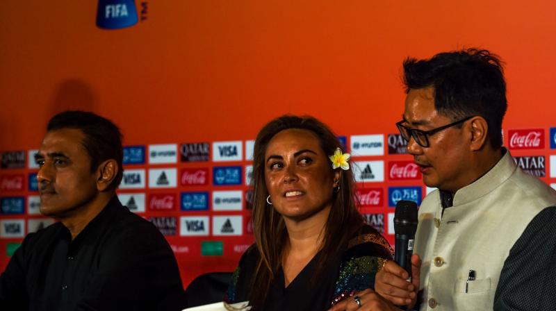 Chief Womens Football Officer for FIFA, Sarai Bareman (C) looks asIndian Minister of Youth Affairs and Sports Kiren Rijiju (R) speaks as politician and businessman Praful Patel (L) and look on during the unveiling of the FIFA U-17 Womens World Cup India 2020 Official Emblem in Mumbai on November 2, 2019. (Photo by INDRANIL MUKHERJEE / AFP)