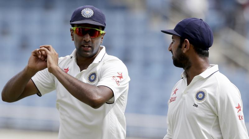 Cheteshwar Pujara has thrown his weight behind star spinner Ravi Ashwin, saying he has made changes he believes will help him finally enjoy success in Australia in the four-test series starting in Adelaide. (Photo: AP) Cheteshwar Pujara has thrown his weight behind star spinner Ravi Ashwin, saying he has made changes he believes will help him finally enjoy success in Australia in the four-test series starting in Adelaide. (Photo: AP)