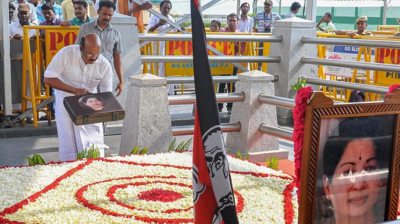 Tamil Nadu Finance Minister D Jayakumar paying respects at the memorial of the late AIADMK Supremo J Jayalalithaa prior to presenting his first budget for the financial year 2017-18 in Chennai. (Photo: PTI) Tamil Nadu Finance Minister D Jayakumar paying respects at the memorial of the late AIADMK Supremo J Jayalalithaa prior to presenting his first budget for the financial year 2017-18 in Chennai. (Photo: PTI)