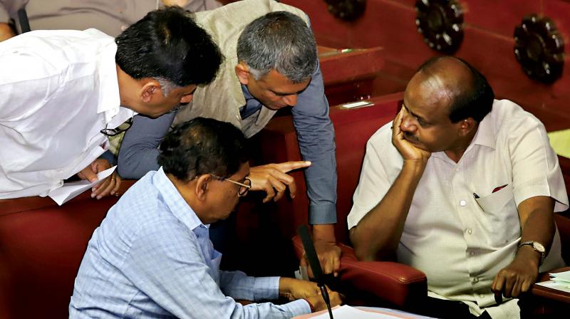 Chief Minister H.D. Kumaraswamy in discussion with DyCM Dr G. Parameshwar and Ministers Krishna Byre Gowda and D.K. Shivakumar during Assembly session at Vidhana Soudha in Bengaluru on Monday (Image DC) Chief Minister H.D. Kumaraswamy in discussion with DyCM Dr G. Parameshwar and Ministers Krishna Byre Gowda and D.K. Shivakumar during Assembly session at Vidhana Soudha in Bengaluru on Monday (Image DC)