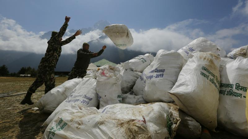 A team of 20 sherpas collected 5 metric tonnes of garbage from the camps above the base camp and another six metric tonnes from the camps below it. (Photo: AP) A team of 20 sherpas collected 5 metric tonnes of garbage from the camps above the base camp and another six metric tonnes from the camps below it. (Photo: AP)
