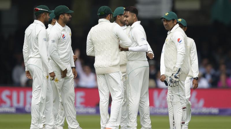 Although there is no suggestion of impropriety, that Pakistan's Asad Shafiq and Babar Azam were seen wearing what appeared to be 'smart watches' concerned the ICC. (Photo: AP) Although there is no suggestion of impropriety, that Pakistan's Asad Shafiq and Babar Azam were seen wearing what appeared to be 'smart watches' concerned the ICC. (Photo: AP)