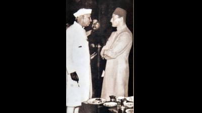 Prime Minister Jawaharlal Nehru with young prince Mukarram Jah Bahadur at a dinner party in Hyderabad in early 1950's. (Photo: DC)