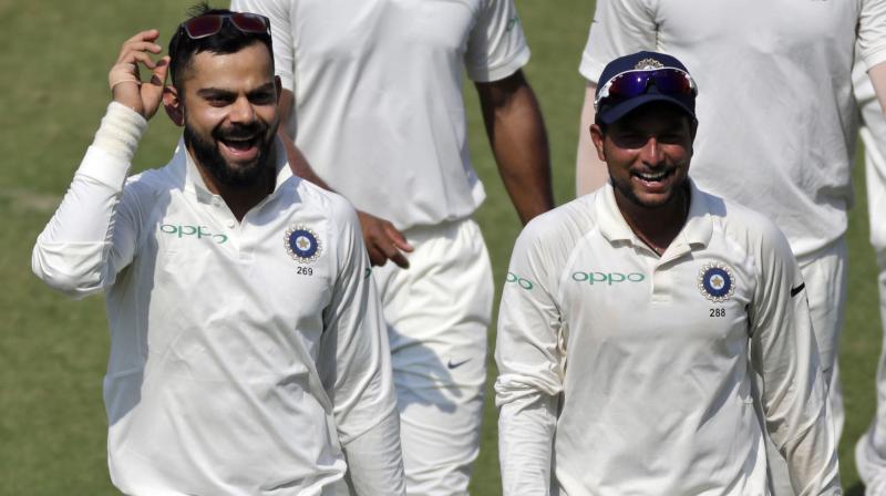 "After coming back from England, I went to my coach at home, bowled with the red ball for three four days. It was difficult because after playing white ball format you lose rhythm with the red ball. I mainly focused on release of red ball, bowling slower as you tend to bowl faster with a white ball," said Kuldeep Yadav. (Photo: AP) "After coming back from England, I went to my coach at home, bowled with the red ball for three four days. It was difficult because after playing white ball format you lose rhythm with the red ball. I mainly focused on release of red ball, bowling slower as you tend to bowl faster with a white ball," said Kuldeep Yadav. (Photo: AP)