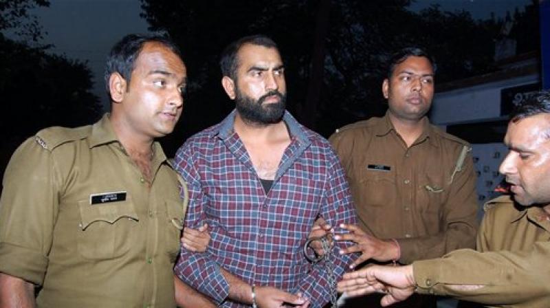 Police arrest Palwinder Singh, one of the Nabha jail attackers. (Photo: PTI) Police arrest Palwinder Singh, one of the Nabha jail attackers. (Photo: PTI)