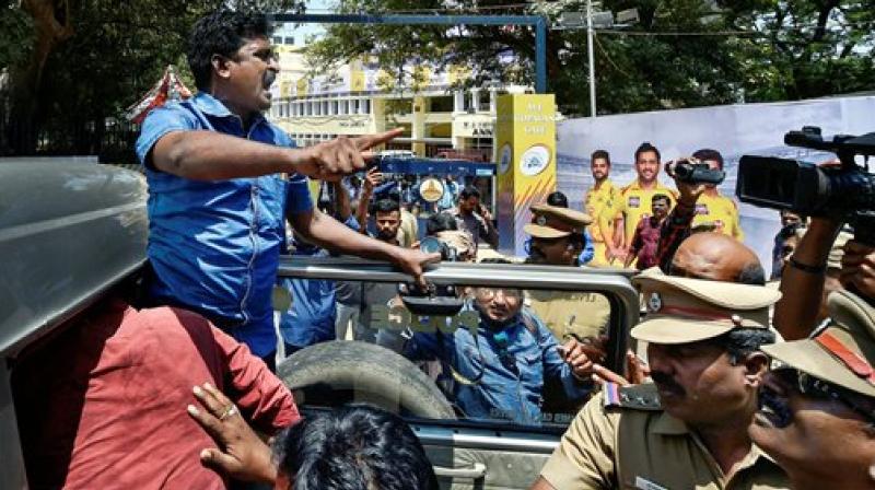 Police detain activists of Tamizhaga Vazhvurimai Katchi who were staging an anti-IPL protest outside MAC Stadium in Chennai on Tuesday. (Photo: PTI) Police detain activists of Tamizhaga Vazhvurimai Katchi who were staging an anti-IPL protest outside MAC Stadium in Chennai on Tuesday. (Photo: PTI)