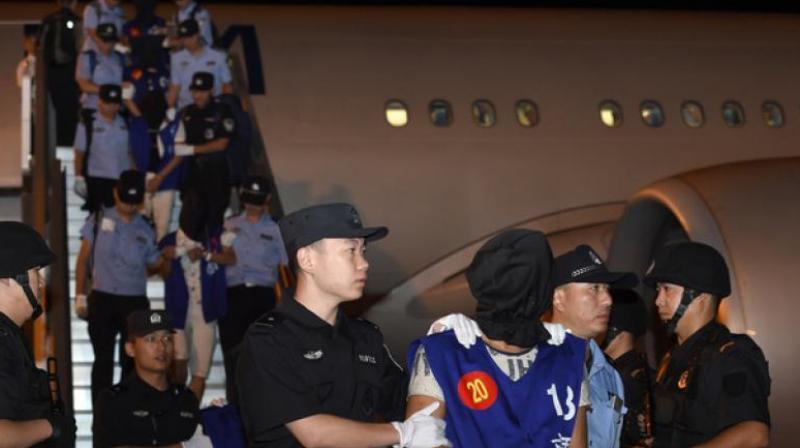 Beijing insists that Taiwanese fraud suspects should be sent to China to face trial because their telecom fraud crimes largely target mainland Chinese. (Photo: AFP) Beijing insists that Taiwanese fraud suspects should be sent to China to face trial because their telecom fraud crimes largely target mainland Chinese. (Photo: AFP)