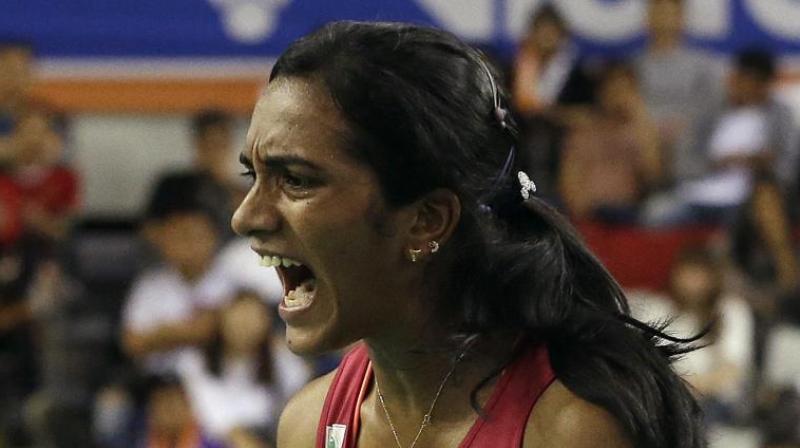 Sindhu, seeded third, dished out a compact game to outwit Sayaka 21-17 21-16 in a second round match on Thursday to set up a clash with seventh seeded Chinese He Bingjiao. (Photo: AP) Sindhu, seeded third, dished out a compact game to outwit Sayaka 21-17 21-16 in a second round match on Thursday to set up a clash with seventh seeded Chinese He Bingjiao. (Photo: AP)