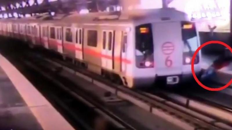 Following the incident, Delhi Metro authorities questioned Mayur about his dangerous act. (Screengrab | ANI) Following the incident, Delhi Metro authorities questioned Mayur about his dangerous act. (Screengrab | ANI)