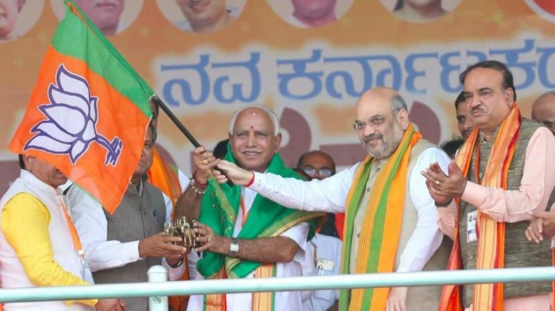 BJP chief Amit Shah kickstarted the BJP state unit's ‘Nava Karnataka Nirmana Parivarthana Yatra’ rally in Bengaluru. (Photo: Amit Shah | Twitter) BJP chief Amit Shah kickstarted the BJP state unit's ‘Nava Karnataka Nirmana Parivarthana Yatra’ rally in Bengaluru. (Photo: Amit Shah | Twitter)