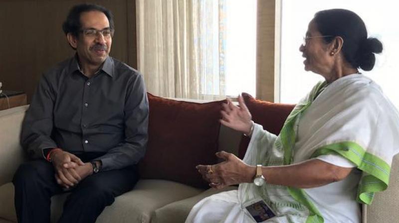 Shiv Sena chief Uddhav Thackeray called on West Bengal Chief Minister Mamata Banerjee at Mumbai. (Photo: ANI | Twitter) Shiv Sena chief Uddhav Thackeray called on West Bengal Chief Minister Mamata Banerjee at Mumbai. (Photo: ANI | Twitter)