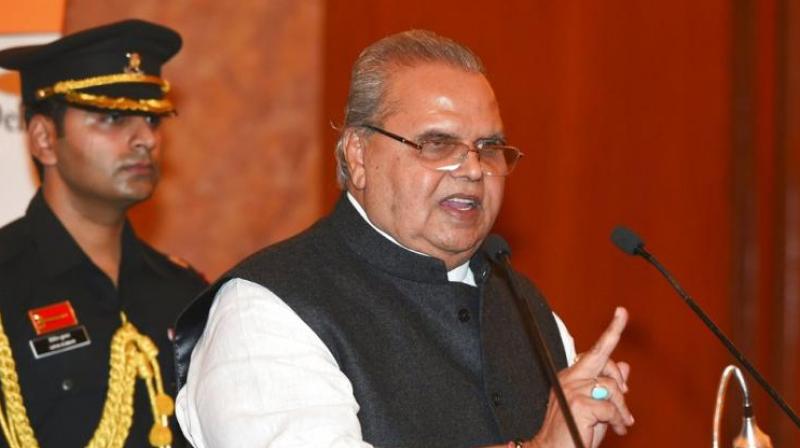ammu and Kashmir Governor Satya Pal Malik on Thursday said former prime minister Rajiv Gandhi was initially not corrupt but under the influence of some people, he got involved in the Bofors corruption case. (Photo: File) ammu and Kashmir Governor Satya Pal Malik on Thursday said former prime minister Rajiv Gandhi was initially not corrupt but under the influence of some people, he got involved in the Bofors corruption case. (Photo: File)