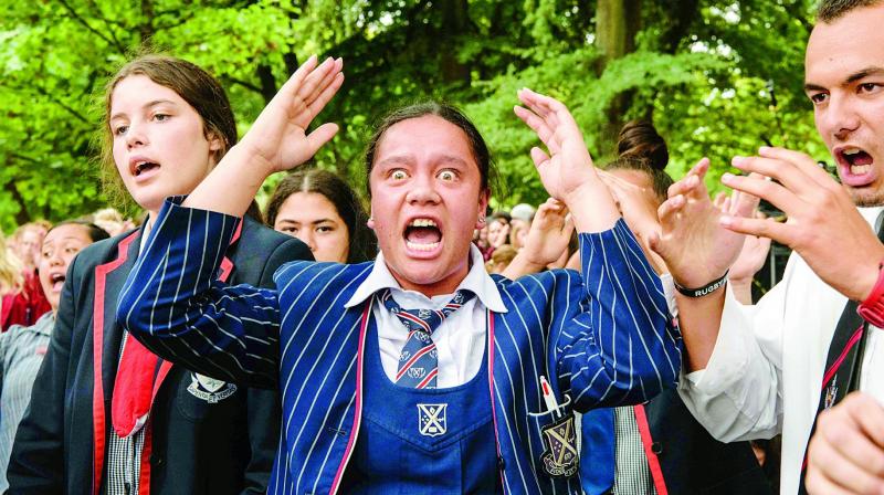 School students perform haka, a traditional Maori ceremonial dance, during a vigil in Christchurch on Monday, three days after the shooting incident. (Photo: AFP) School students perform haka, a traditional Maori ceremonial dance, during a vigil in Christchurch on Monday, three days after the shooting incident. (Photo: AFP)
