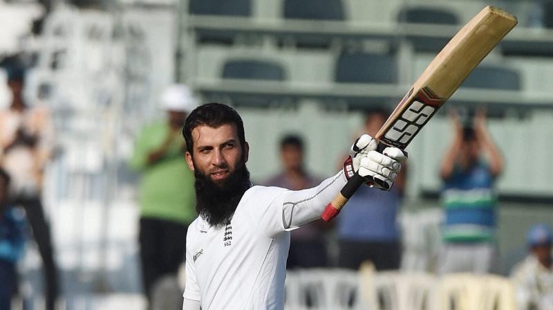 England's Moeen Ali raises his bat after scoring century during the first day of the fifth cricket test match against India at MAC Stadium in Chennai on Friday. (Photo: AP) England's Moeen Ali raises his bat after scoring century during the first day of the fifth cricket test match against India at MAC Stadium in Chennai on Friday. (Photo: AP)