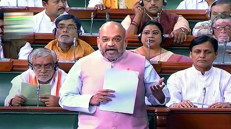 Union home minister Amit Shah speaks in the Lok Sabha during the Budget Session of Parliament on Friday. (Photo: PTI) Union home minister Amit Shah speaks in the Lok Sabha during the Budget Session of Parliament on Friday. (Photo: PTI)