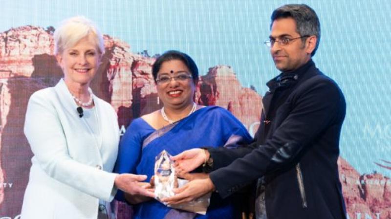 IPS Officer Chhaya Sharma (Centre) while receiving McCain Institute award for Courage and Leadership. (Photo: ANI) IPS Officer Chhaya Sharma (Centre) while receiving McCain Institute award for Courage and Leadership. (Photo: ANI)