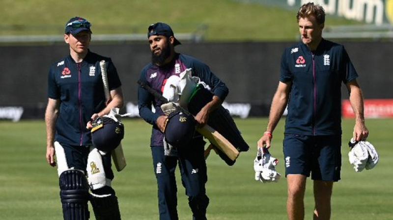 Eoin Morgan (left), Adil Rashid and Joe Root in this photo. - Twitter