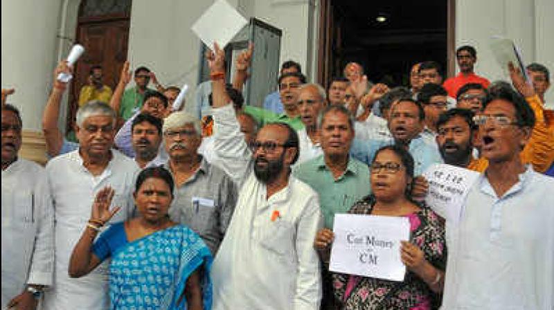 Trilochan Mukhopadhyay, a TMC booth president on the outskirts of district headquarter town Suri, returned the amount to 141 people, from whom he had taken for providing them jobs under the MGNREGA scheme. (Photo: PTI) Trilochan Mukhopadhyay, a TMC booth president on the outskirts of district headquarter town Suri, returned the amount to 141 people, from whom he had taken for providing them jobs under the MGNREGA scheme. (Photo: PTI)