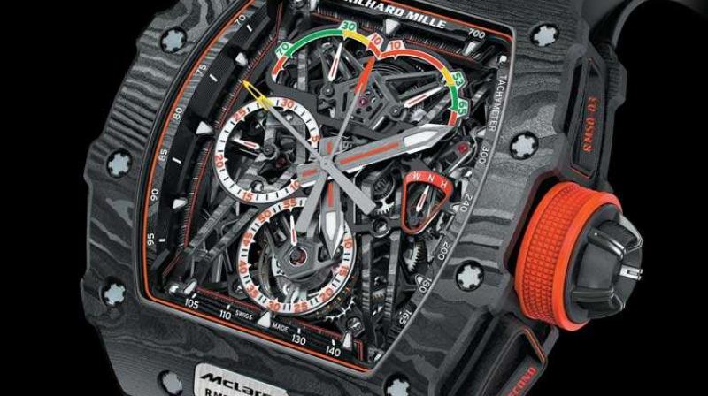 The RM 50-03 watch was made using a unique composite incorporating graphene to manufacture a strong but lightweight new case to house the delicate watch mechanism. The RM 50-03 watch was made using a unique composite incorporating graphene to manufacture a strong but lightweight new case to house the delicate watch mechanism.