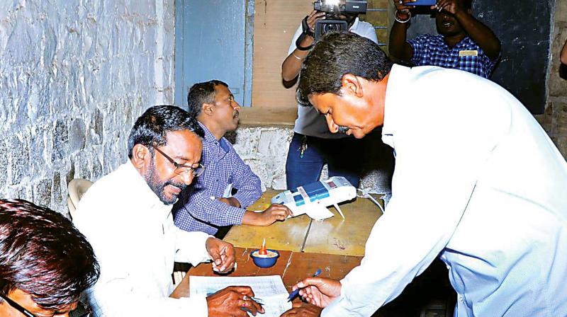 BJPs Ramesh Jarkiholi at a polling booth in Gokak on Thursday