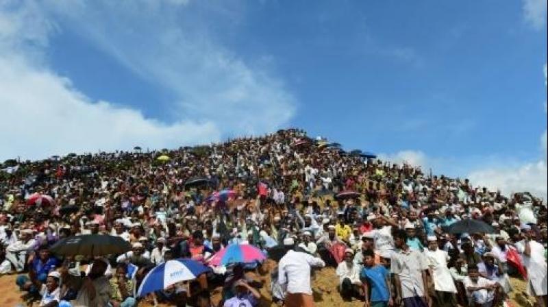 Under the scorching sun, thousands joined in a popular song with the lyrics 'the world does not listen to the woes of Rohingya'. (Photo: AFP) Under the scorching sun, thousands joined in a popular song with the lyrics 'the world does not listen to the woes of Rohingya'. (Photo: AFP)