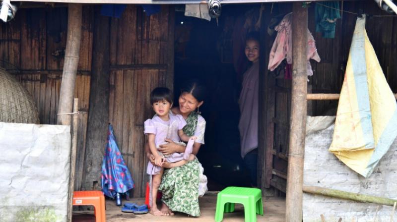Kongthong has long been cut off from the rest of the world, several hours of tough trek from the nearest town. Electricity arrived only in 2000, and the dirt road in 2013. (Photo: AFP) Kongthong has long been cut off from the rest of the world, several hours of tough trek from the nearest town. Electricity arrived only in 2000, and the dirt road in 2013. (Photo: AFP)