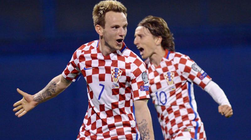In possibly their last World Cup as midfield partners, Luka Modric and Ivan Rakitic were named Monday in the provisional Croatia squad for the tournament in Russia. (Photo: AFP) In possibly their last World Cup as midfield partners, Luka Modric and Ivan Rakitic were named Monday in the provisional Croatia squad for the tournament in Russia. (Photo: AFP)