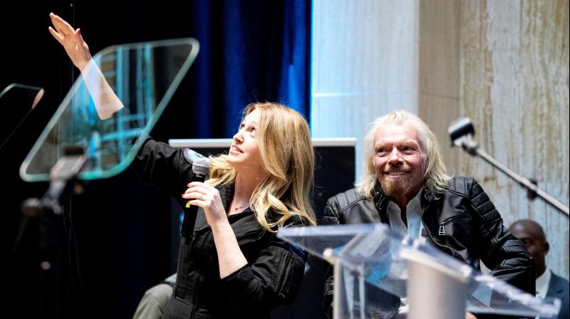 Beth Moses, chief astronaut instructor, describes her flight into space while on stage with Virgin Galactic founder Sir Richard Branson (right), during an event announcing the company's move to New Mexico. (Photo: AP) Beth Moses, chief astronaut instructor, describes her flight into space while on stage with Virgin Galactic founder Sir Richard Branson (right), during an event announcing the company's move to New Mexico. (Photo: AP)
