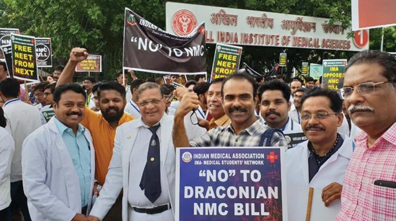 Doctors protesting against the NMC bill in front of the All-India Institute of Medical Sciences, New Delhi Doctors protesting against the NMC bill in front of the All-India Institute of Medical Sciences, New Delhi