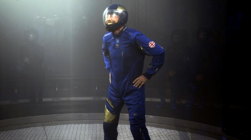 The Virgin Galactic suits were unveiled in the wake of NASA's presentation of new uniform prototypes for 'real' American astronauts, who are set to return to the Moon in 2024. (Photo: AFP). The Virgin Galactic suits were unveiled in the wake of NASA's presentation of new uniform prototypes for 'real' American astronauts, who are set to return to the Moon in 2024. (Photo: AFP).