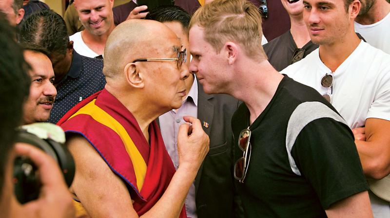 Tibetan spiritual leader the Dalai Lama and Australian cricket captain Steven Smith at an interaction with the team, at the Tsuglakhang temple in Dharamsala on Friday. (Photo: AP) Tibetan spiritual leader the Dalai Lama and Australian cricket captain Steven Smith at an interaction with the team, at the Tsuglakhang temple in Dharamsala on Friday. (Photo: AP)