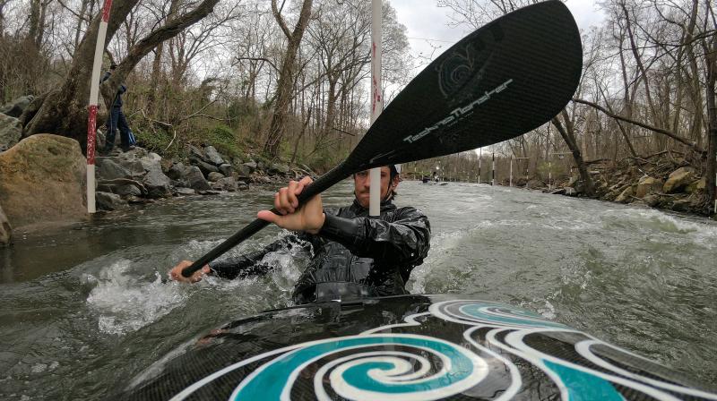 Team USA Kayak athlete Tyler Uthus Westfall trains in the Potomac River on March 26, 2020 in Brookmont, Maryland. Officials announced on Tuesday that the 2020 Summer Olympics and Paralympics in Tokyo are being postponed by one year due to the global COVID-19 outbreak. Patrick Smith/Getty Images/AFP =