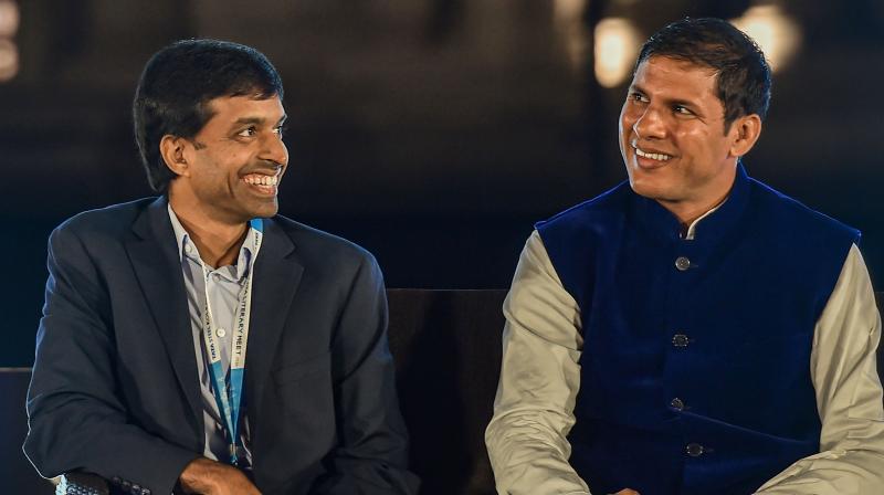 Badminton coach Pullela Gopichand (L) and Paralympian Devendra Jhajharia. PTI Photo Badminton coach Pullela Gopichand (L) and Paralympian Devendra Jhajharia. PTI Photo