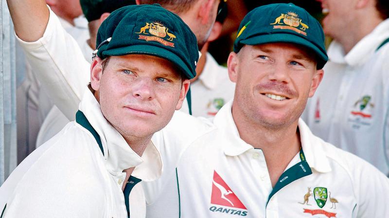 Former Australia cricket captain Steve Smith (L) and teammate David Warner. AFP Photo