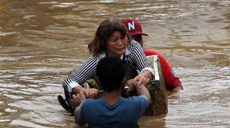‘We're really sad that we have this news especially because our countrymen were looking forward to celebrate Christmas,’ Marina Marasigan of the government's disaster-response agency told a televised news conference. (Photo: AFP) ‘We're really sad that we have this news especially because our countrymen were looking forward to celebrate Christmas,’ Marina Marasigan of the government's disaster-response agency told a televised news conference. (Photo: AFP)