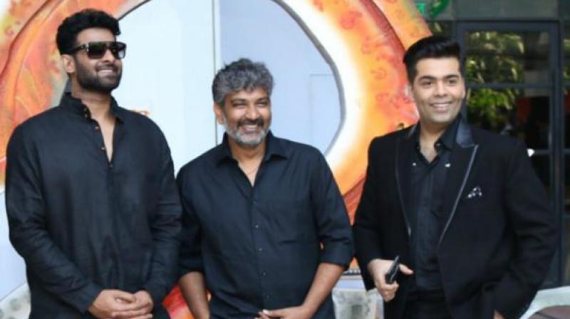 Prabhas, S S Rajamouli and Karan Johar during the promotions of Baahubali: The Conclusion'. Prabhas, S S Rajamouli and Karan Johar during the promotions of Baahubali: The Conclusion'.