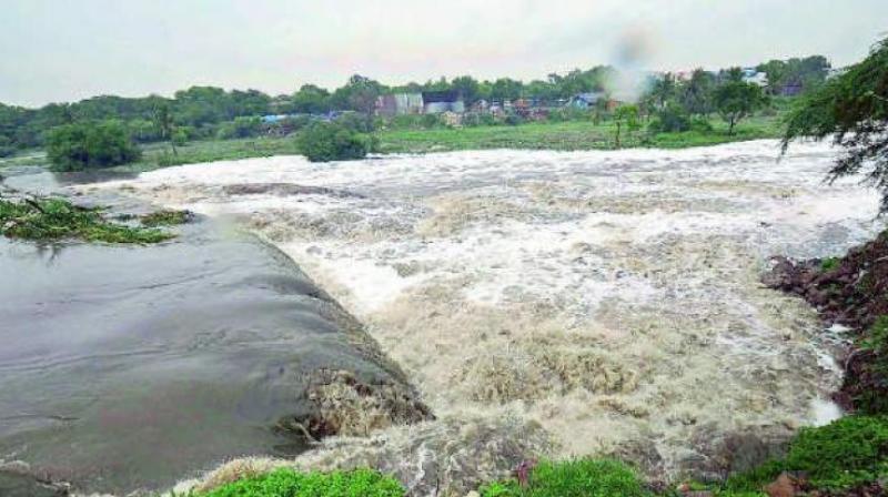 On Friday, with around 60,000 cusecs inflow, the discharge into the river was around 63,000 cusecs through 22 of the 33 crest gates which have been opened to a height of two feet. (Representational image) On Friday, with around 60,000 cusecs inflow, the discharge into the river was around 63,000 cusecs through 22 of the 33 crest gates which have been opened to a height of two feet. (Representational image)
