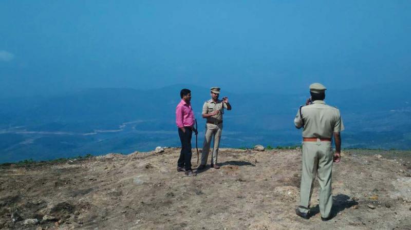 Police and a revenue official visit Pappathichola in Idukki on Saturday. — arrangement Police and a revenue official visit Pappathichola in Idukki on Saturday. — arrangement
