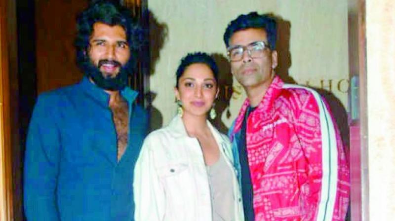 Apparently, the Arjun Reddy star was papped with actress Kiara Advani and filmmaker Karan Johar outside Manish Malhotra’s residence on Monday. Apparently, the Arjun Reddy star was papped with actress Kiara Advani and filmmaker Karan Johar outside Manish Malhotra’s residence on Monday.