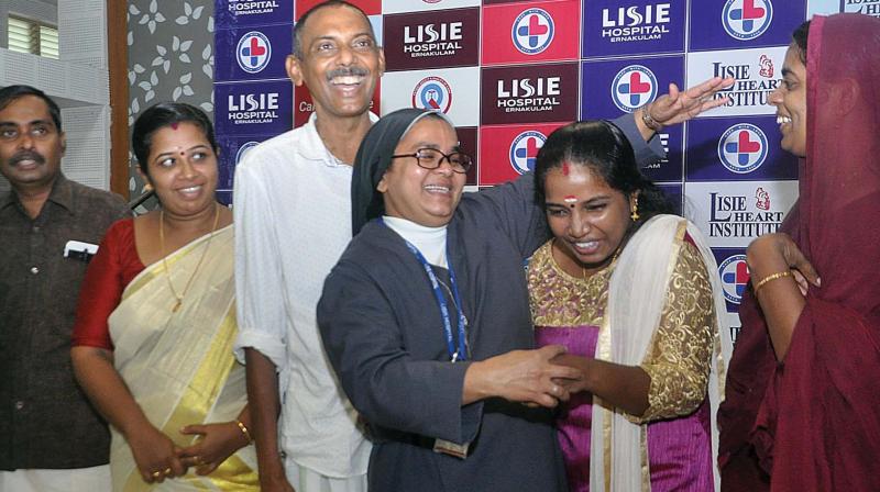 Sr. Alphonsa Koottala, transplant co-ordinator at Lisie Hospital shares a light moment with from (left) Bindukumar, wife Preeta, Muhammed Ashraf, Shijitha and Selina on the occasion of kidney donor-recipient get-together at the hospital in Kochi on Tuesday. — DC Sr. Alphonsa Koottala, transplant co-ordinator at Lisie Hospital shares a light moment with from (left) Bindukumar, wife Preeta, Muhammed Ashraf, Shijitha and Selina on the occasion of kidney donor-recipient get-together at the hospital in Kochi on Tuesday. — DC