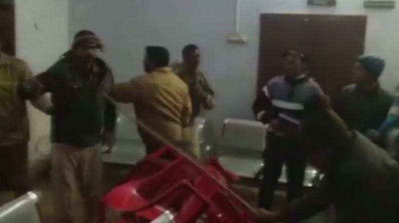 During the programme, supporters of both the leaders clashed over taking credit for the distribution, injuring some of them. (Photo: ANI/Twitter) During the programme, supporters of both the leaders clashed over taking credit for the distribution, injuring some of them. (Photo: ANI/Twitter)