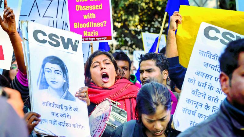 Protestors from women, trans and queer groups during a protest march from Mandi House to Jantar Mantar against the amended Citizenship Act, the NRC and the NPR in New Delhi on Friday.  (PTI)