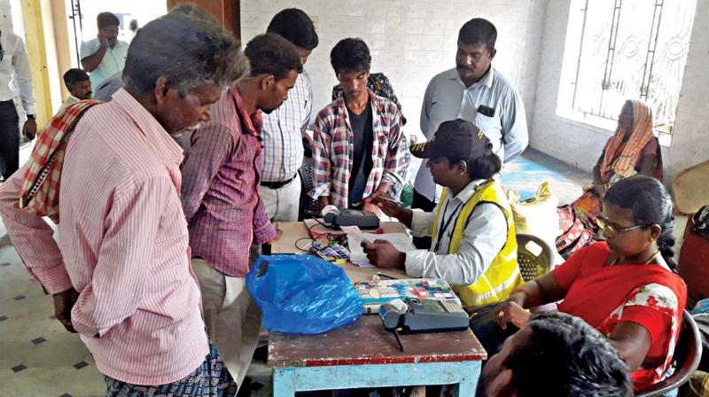 Rescued bonded labourers getting enrolled into Aadhar. —DC Rescued bonded labourers getting enrolled into Aadhar. —DC